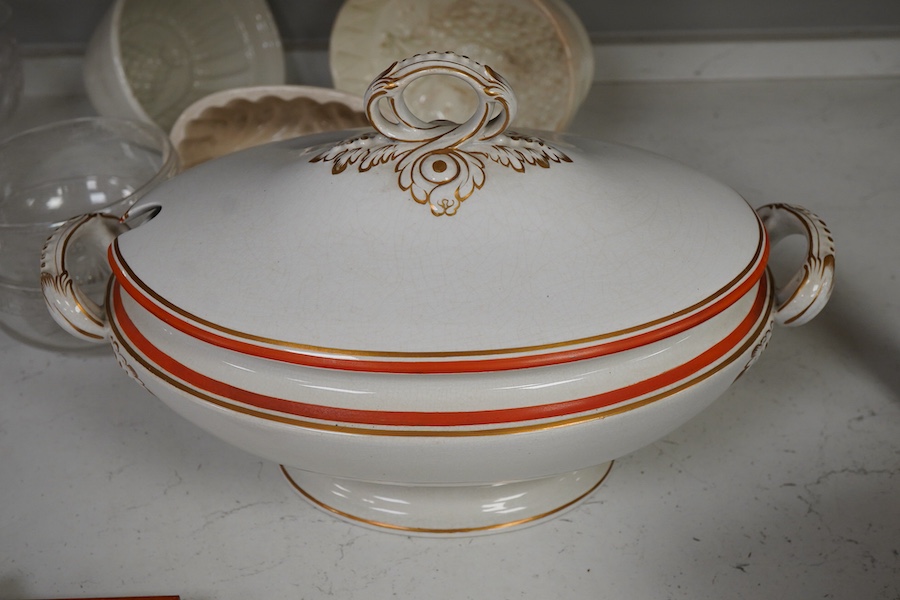 A 19th century tureen, ceramic jelly moulds and a set of glass rinsers, largest 39cm wide